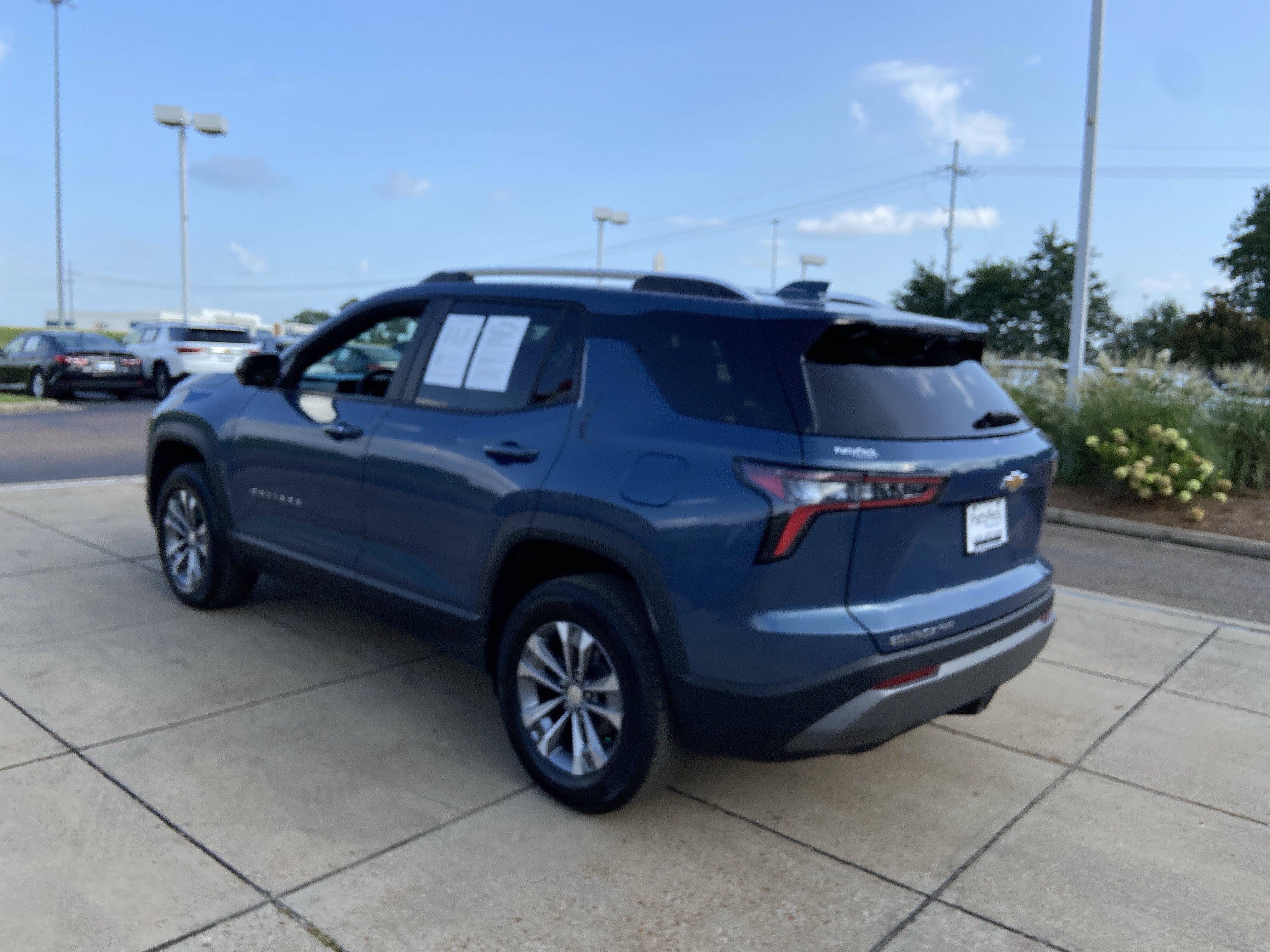Used 2025 Lakeshore Blue Metallic Chevrolet AWD LT image 8