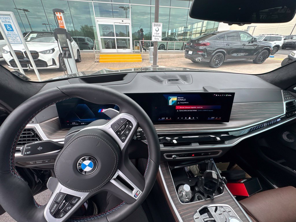 Certified Used 2026 Black Sapphire Metallic BMW M60i image 9