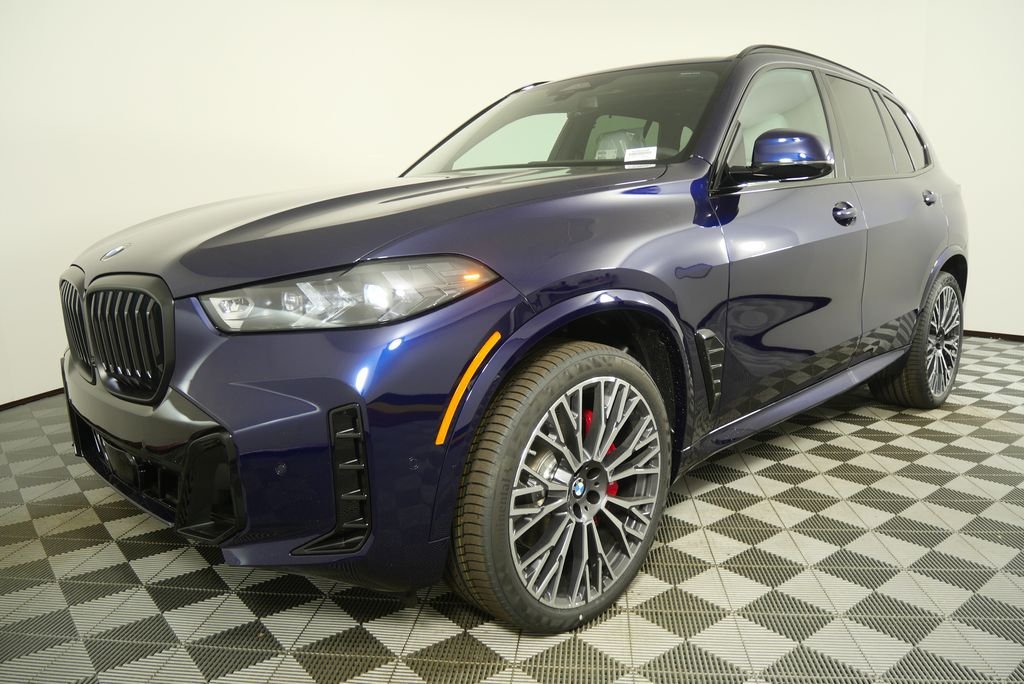 Used 2026 Tanzanite Blue II Metallic BMW sDrive40i image 8