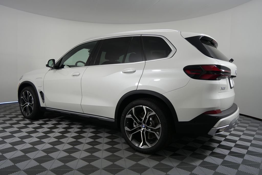 Used 2026 Mineral White Metallic BMW xDrive50e image 4