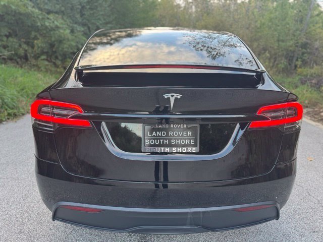 Used 2022 Solid Black Tesla Base image 6
