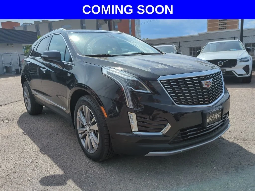 Used 2024 Black Cadillac Premium Luxury image 1