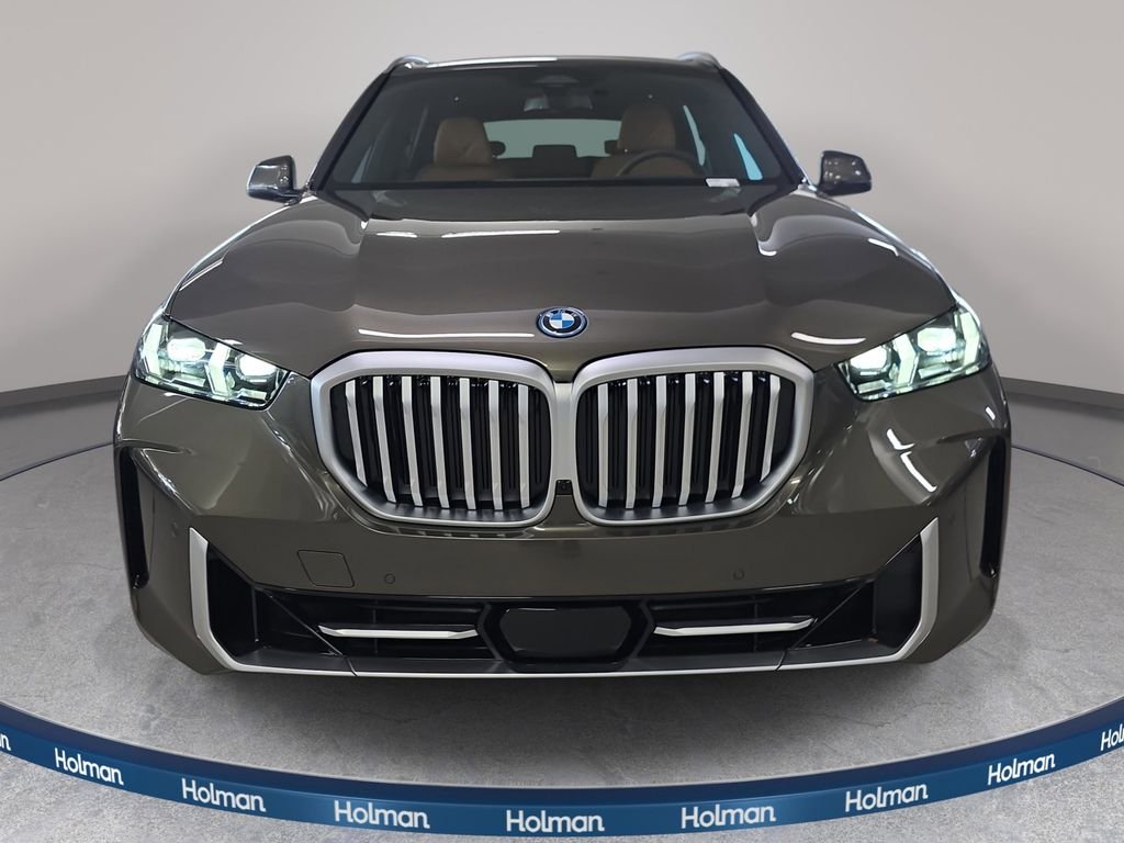 New 2026 Manhattan Green Metallic BMW xDrive50e image 2
