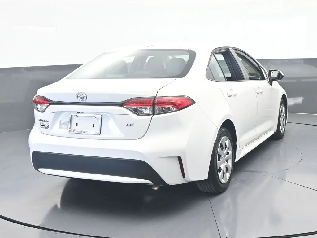 Used 2021 Super White Toyota LE image 4