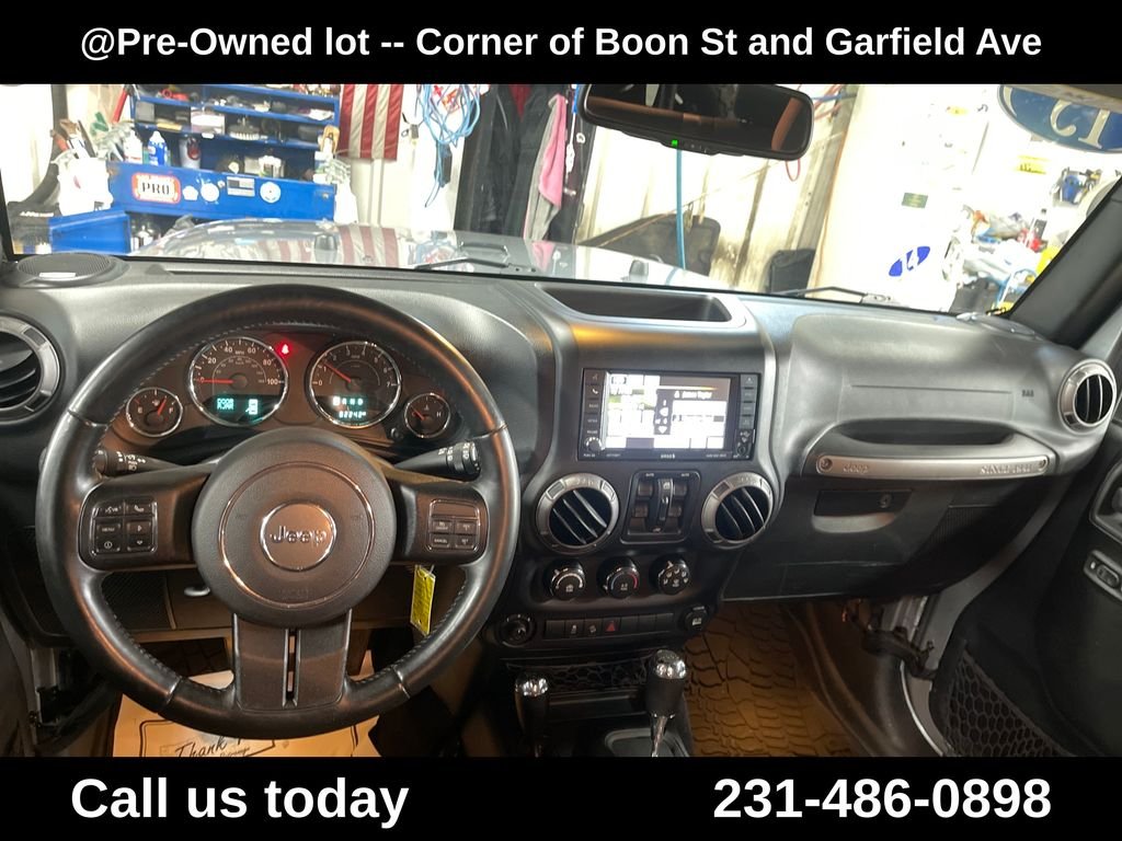 Used 2015 Silver Jeep Unlimited Sport image 18