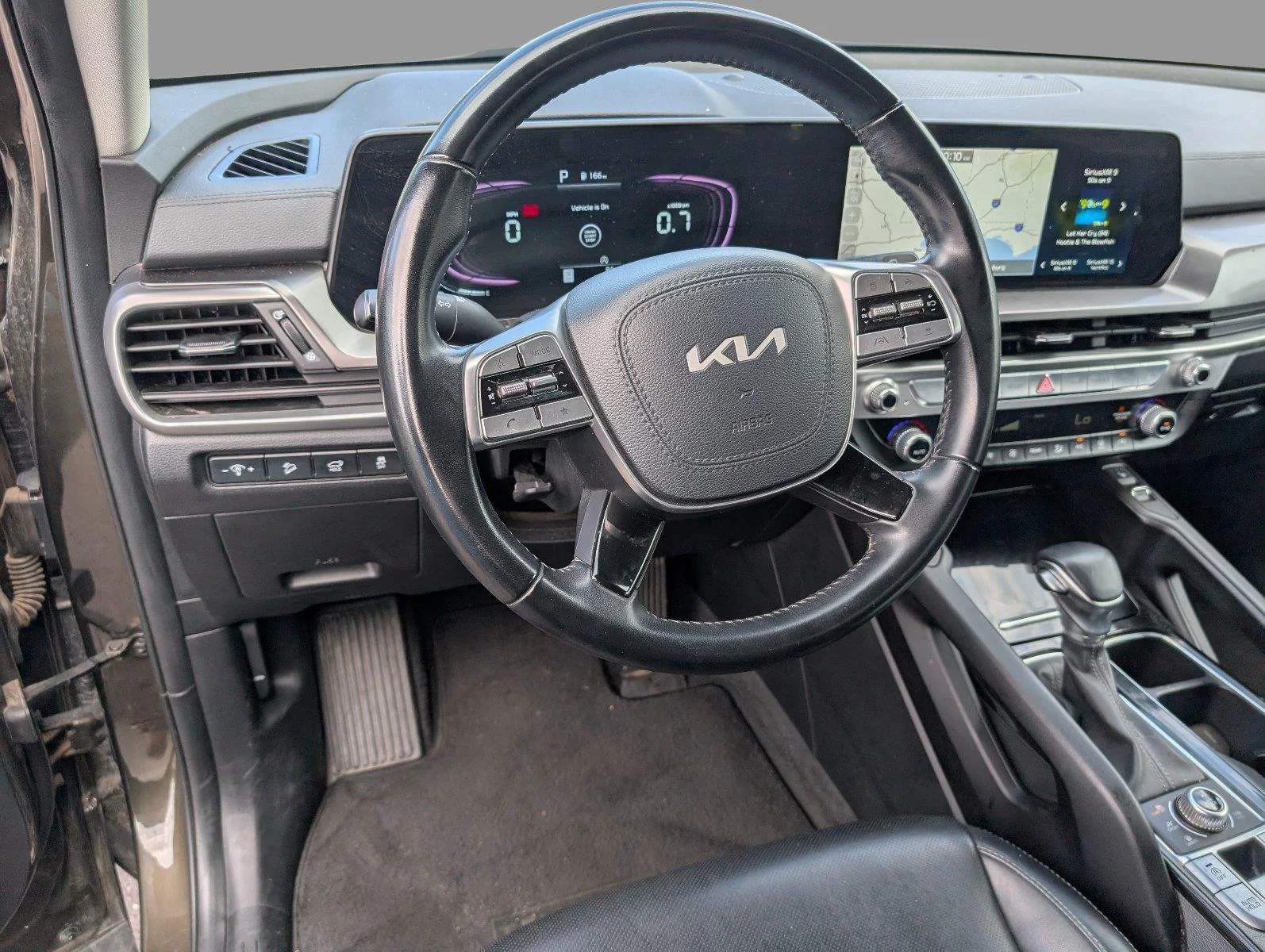Used 2025 Dark Moss Kia S image 4
