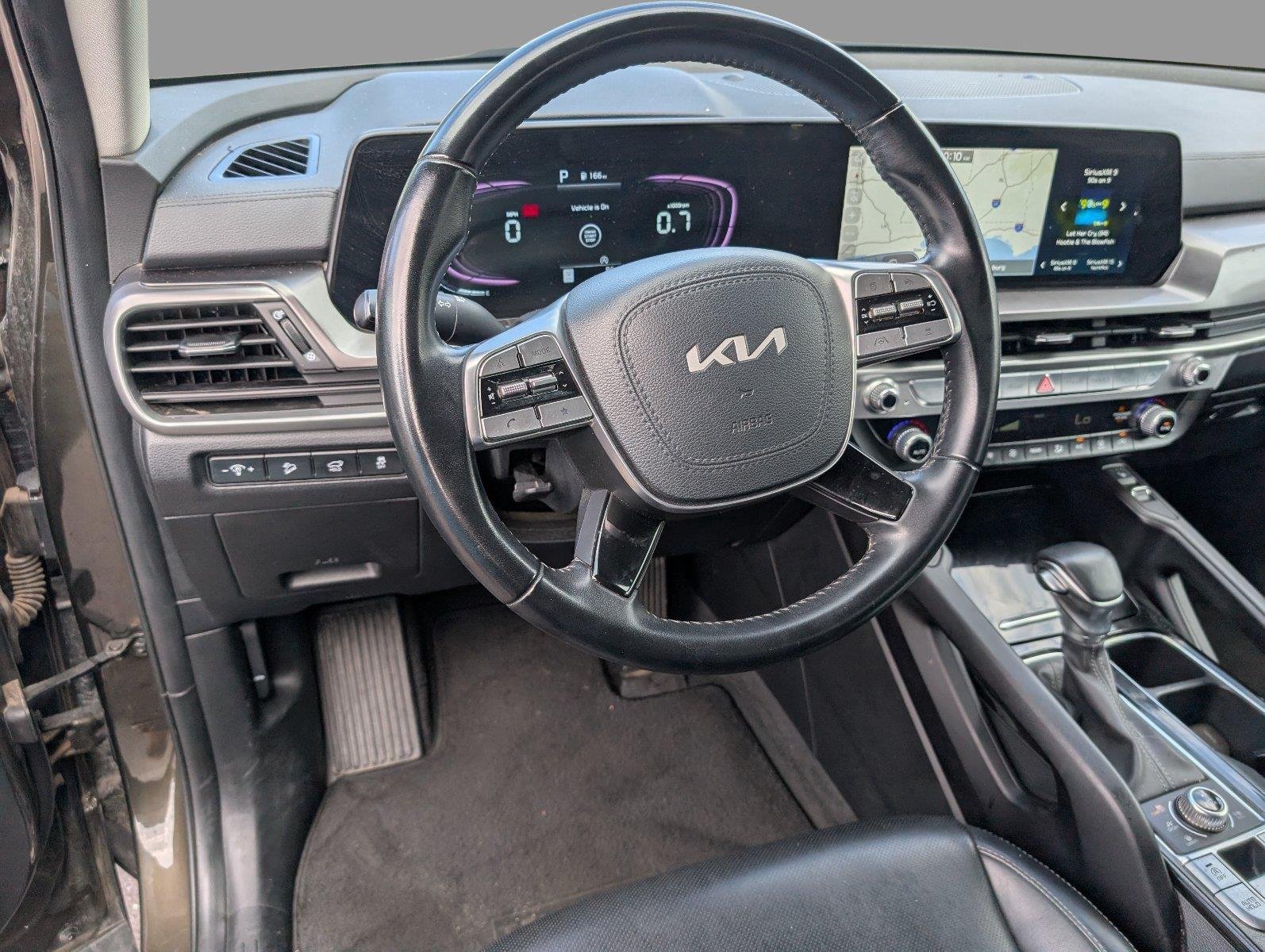 Used 2025 Dark Moss Kia S image 4