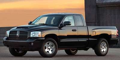 Used 2006 Patriot Blue Pearl Dodge SLT image 1