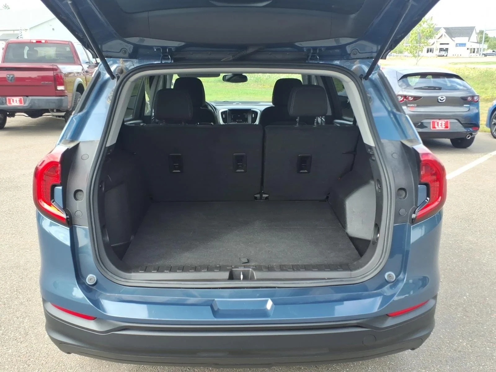Used 2024 Downpour Metallic GMC SLE image 12
