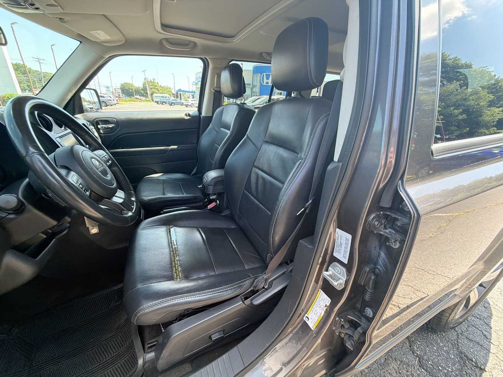 Used 2016 Granite Crystal Metallic Clearcoat Jeep High Altitude Edition image 21