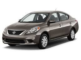Used 2015 Nissan Versa Sedan SL with VIN 3N1CN7AP3FL869385 for sale in Gainesville, FL