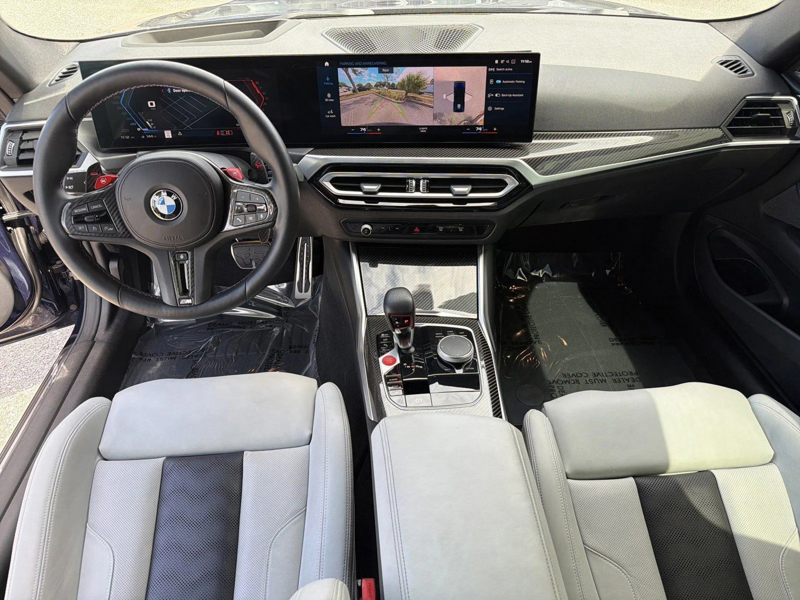Used 2024 Tanzanite Blue II Metallic BMW Competition image 14