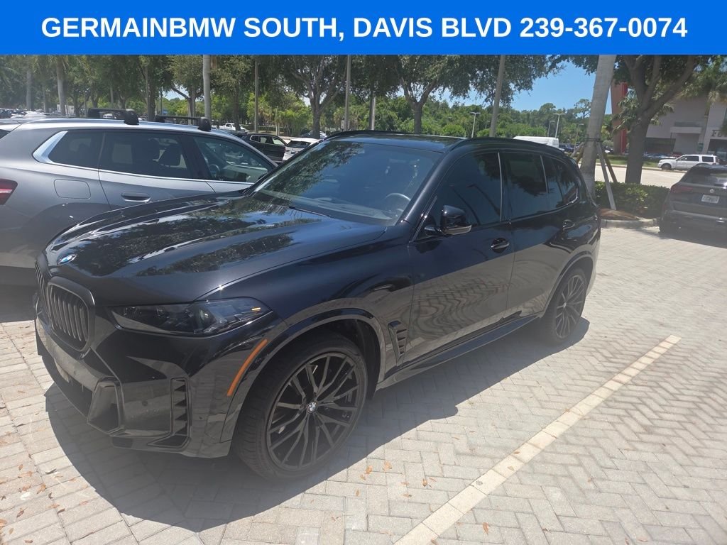 Certified Used 2026 Black Sapphire Metallic BMW sDrive40i image 3