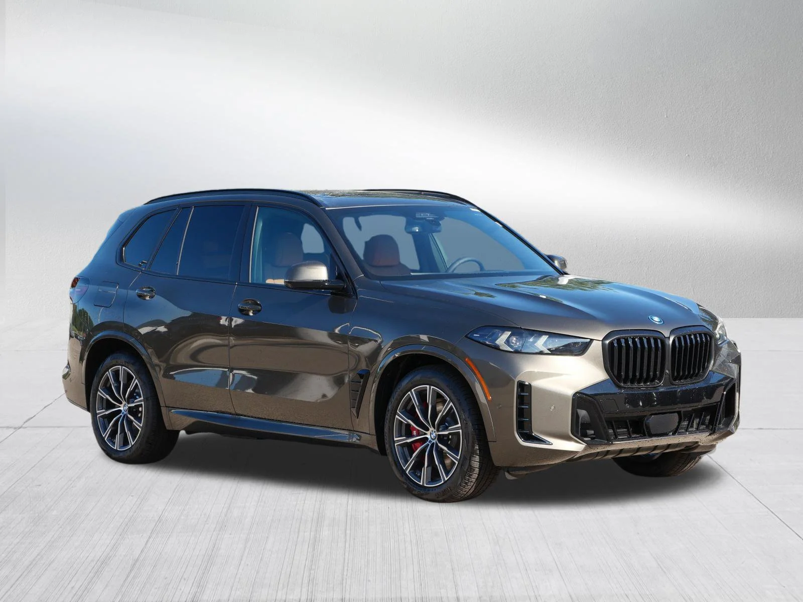 New 2026 Manhattan Green Metallic BMW xDrive50e image 1
