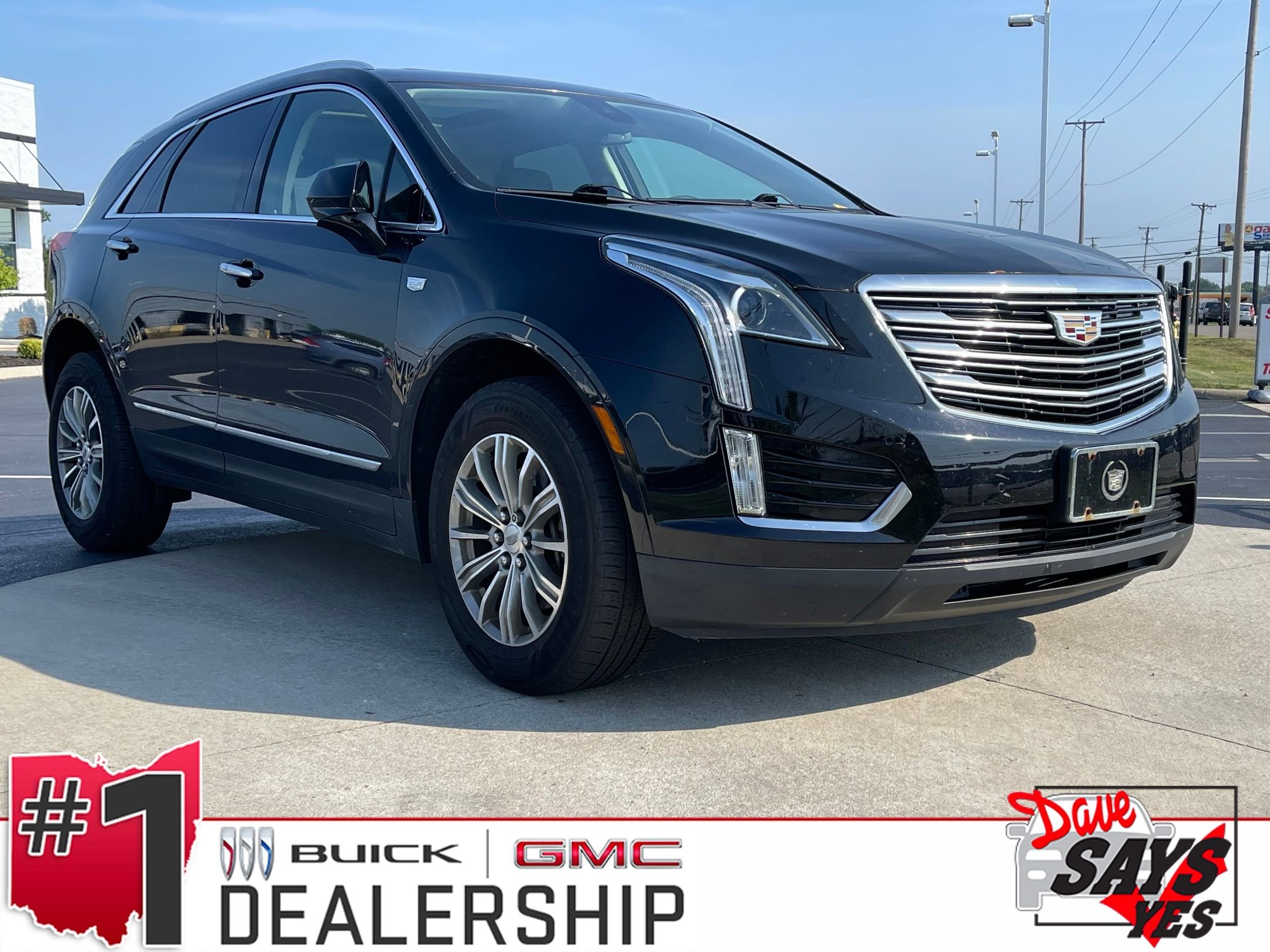 Used 2017 Stellar Black Metallic Cadillac Luxury image 1