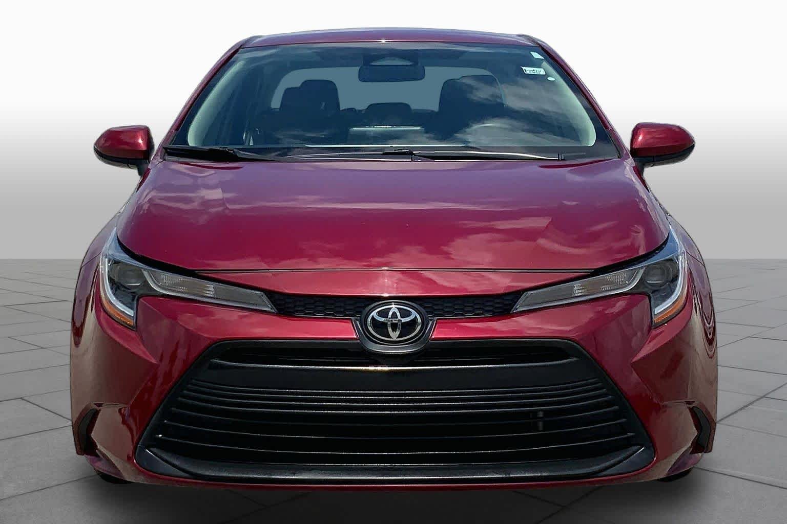 Used 2024 Ruby Flare Pearl Toyota LE image 4