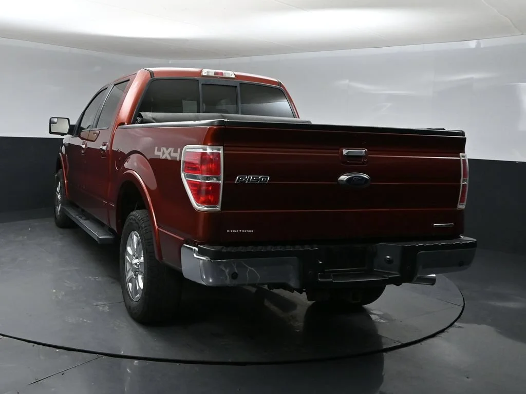 Used 2014 Orange Ford Lariat image 3