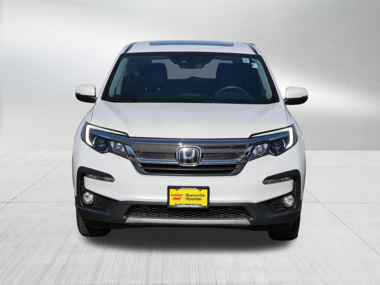 Used 2022 Honda Pilot EX-L with VIN 5FNYF6H56NB099940 for sale in Burnsville, Minnesota