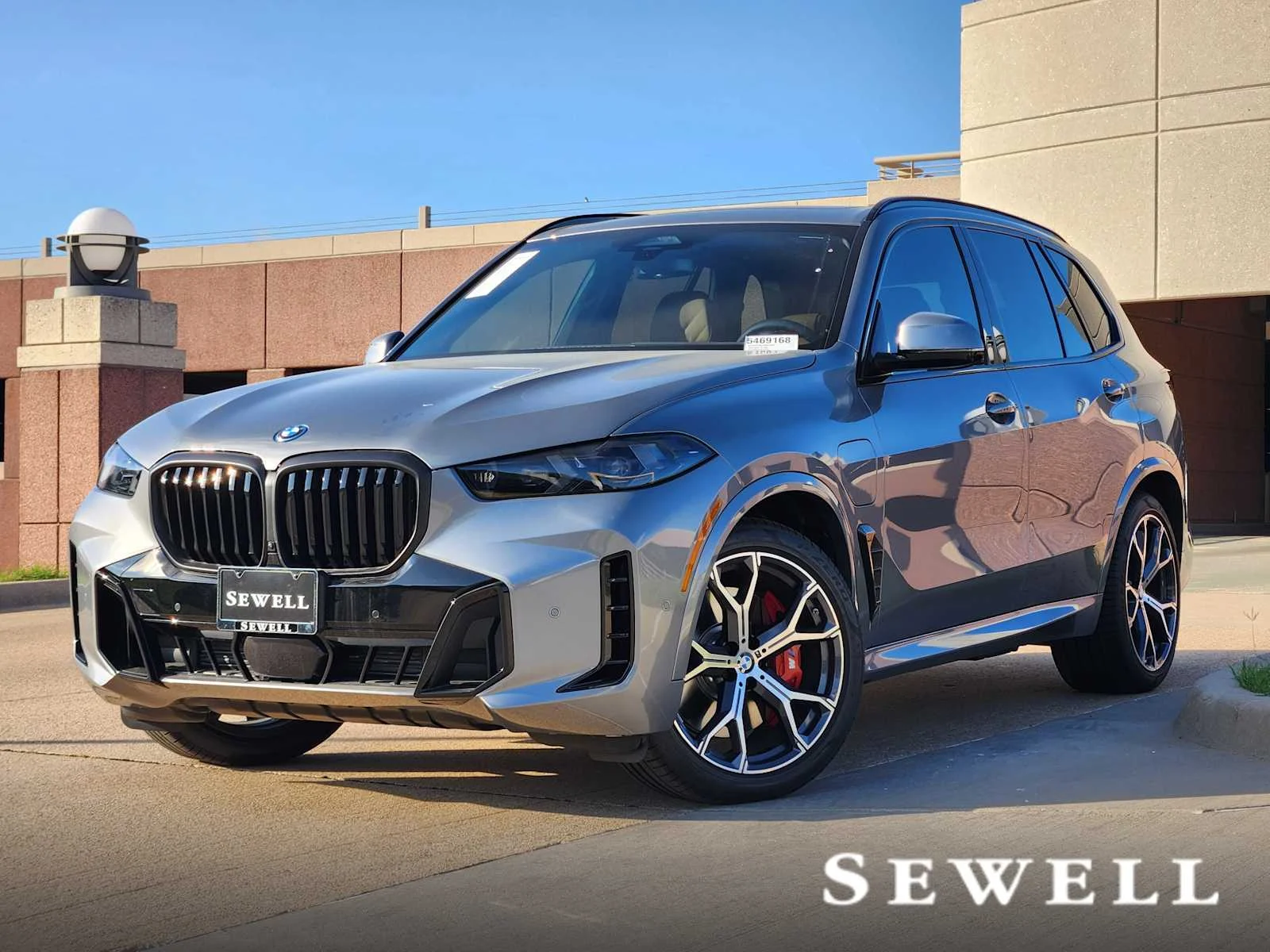 New 2026 Skyscraper Grey Metallic BMW xDrive50e image 1