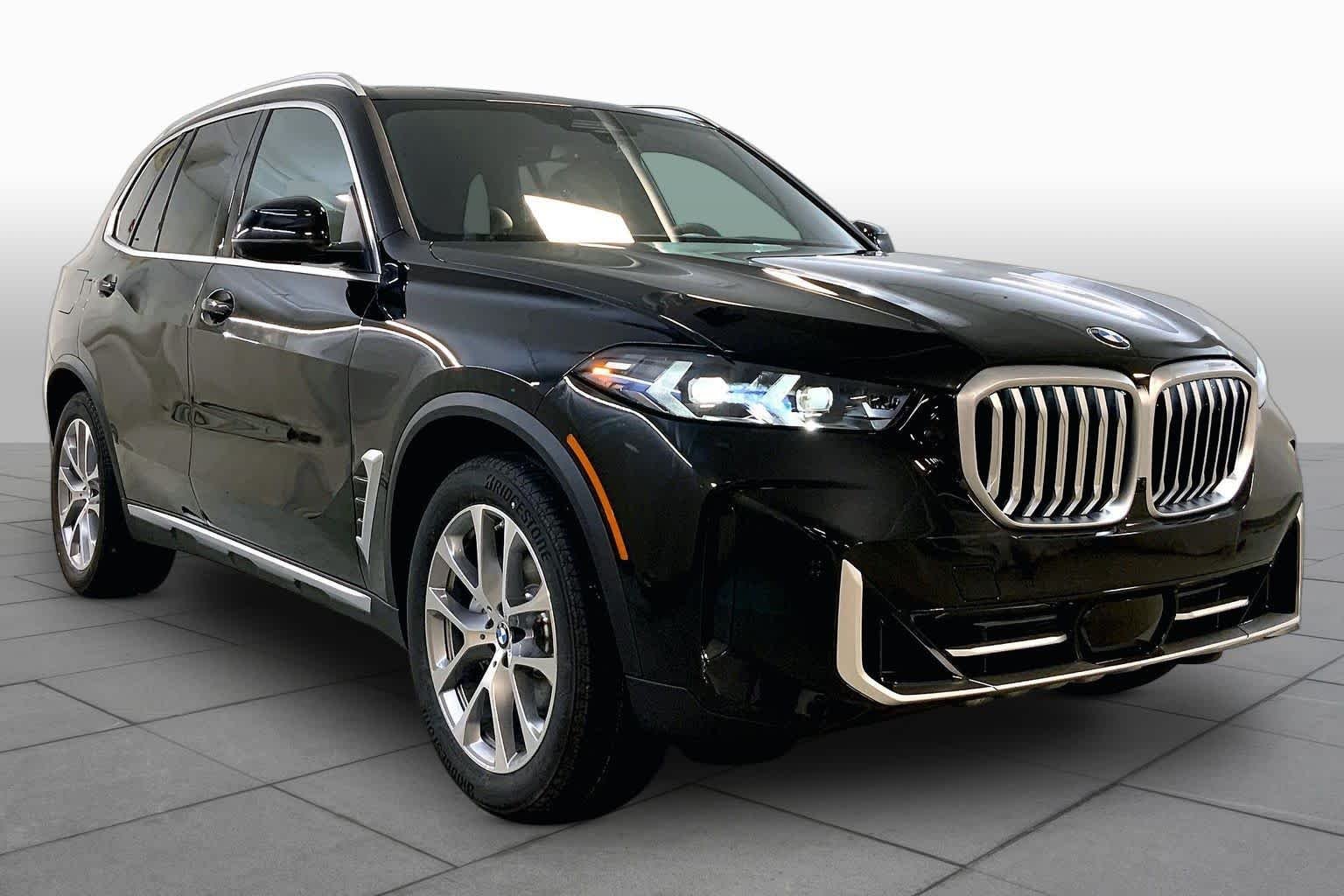 New 2026 Black Sapphire Metallic BMW xDrive40i image 2