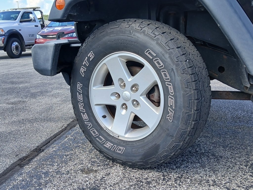 Used 2015 Black Clearcoat Jeep Sport image 8