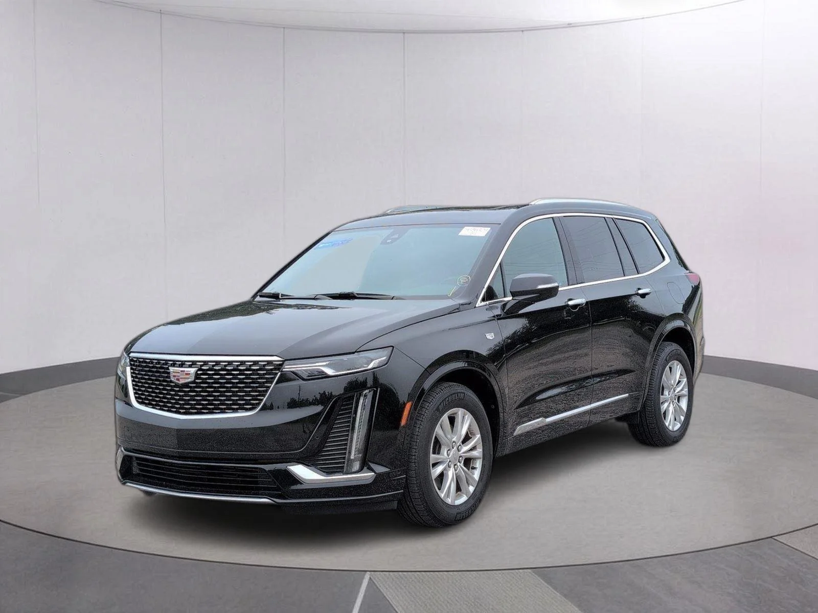 Used 2024 Stellar Black Metallic Cadillac Luxury image 1