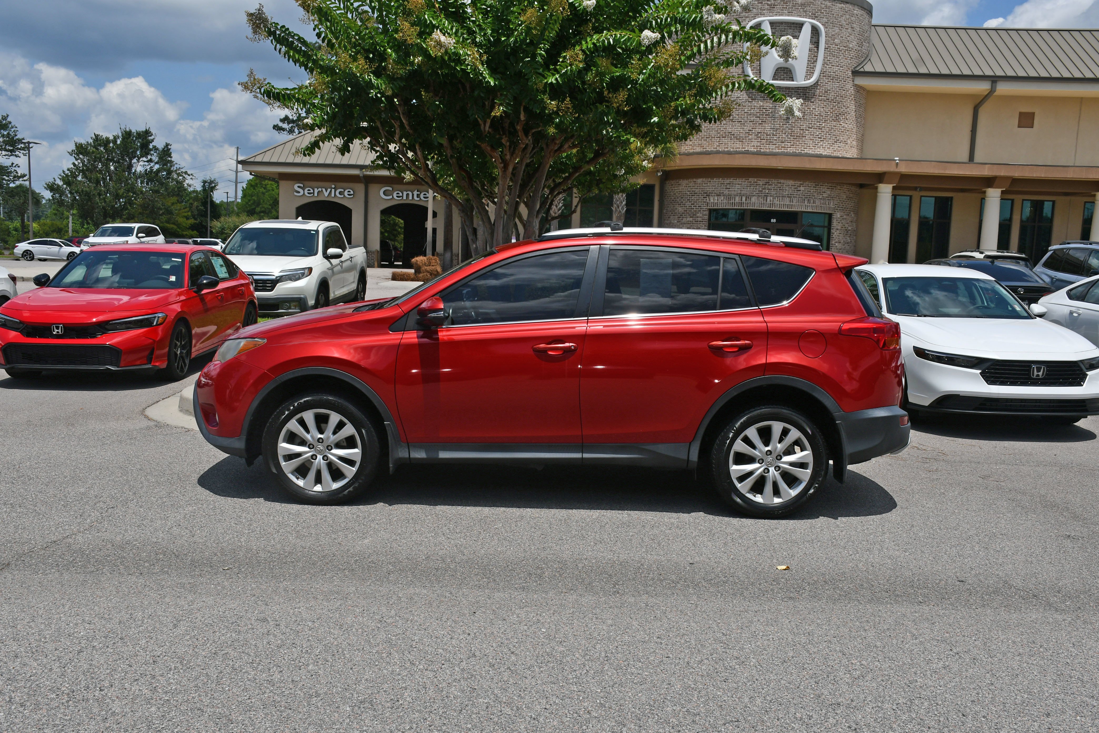 Used 2015 Red Toyota Limited image 1