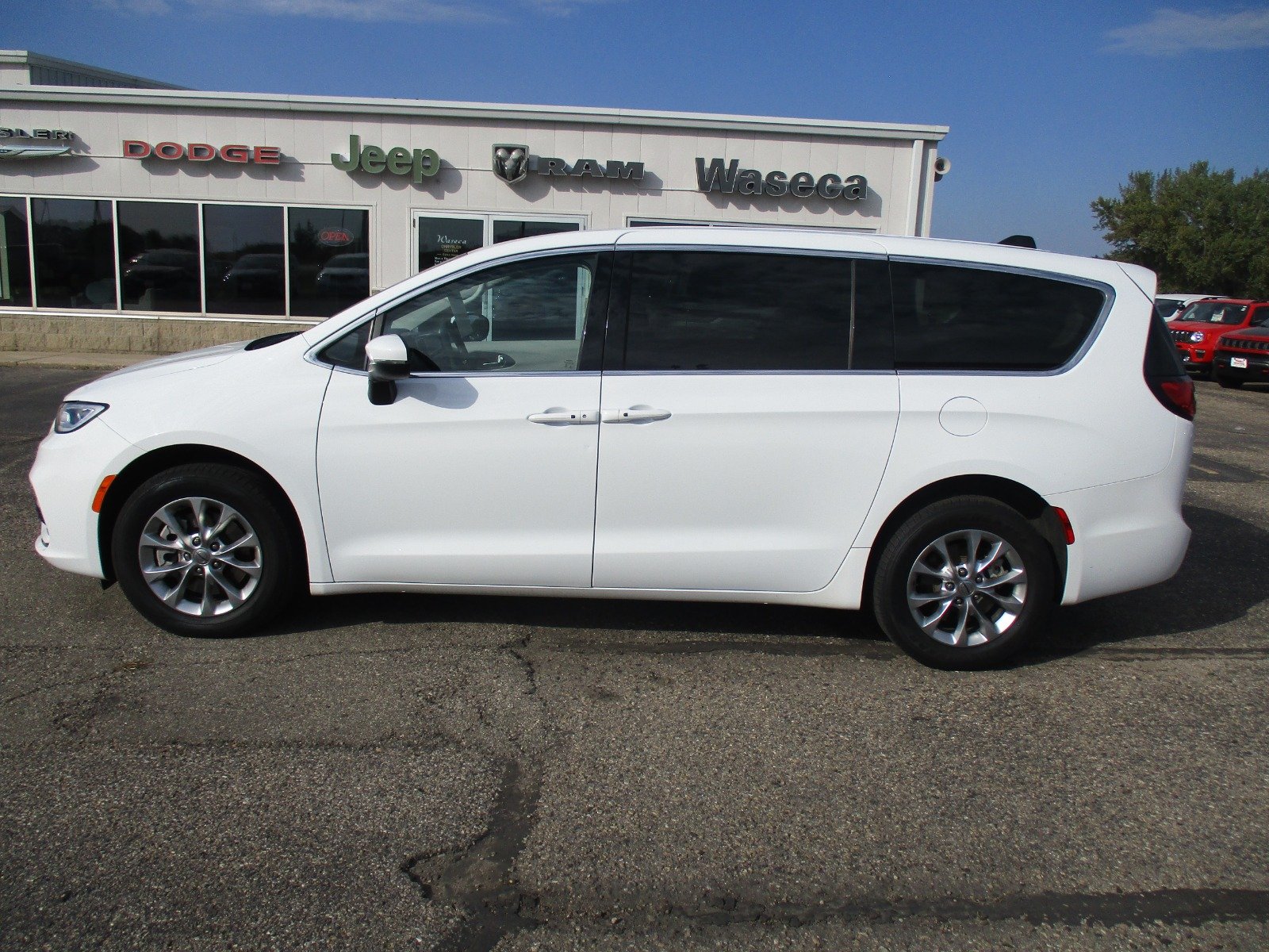 Used 2023 Chrysler Pacifica Touring L with VIN 2C4RC3BG6PR554766 for sale in Waseca, Minnesota