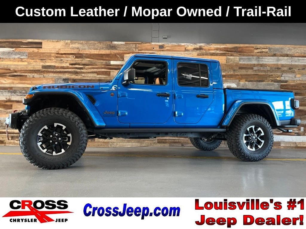 Used 2024 Blue Pearl Jeep Rubicon image 1