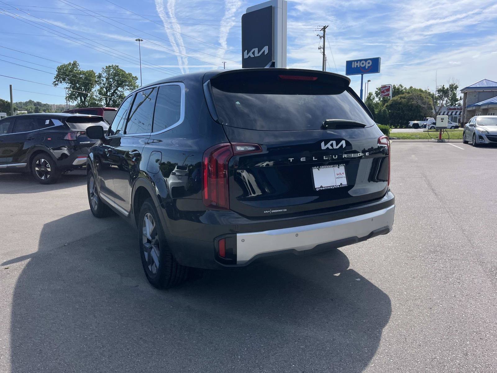 Used 2024 Ebony Black Kia LX image 5