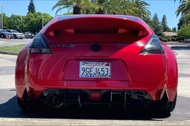 Used 2020 Passion Red Nissan Base image 4
