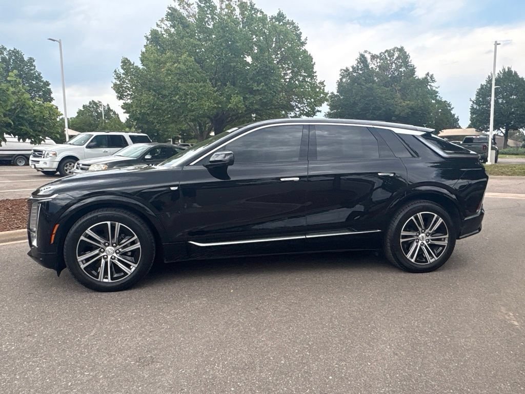 Used 2024 Stellar Black Metallic Cadillac Luxury 1 image 2