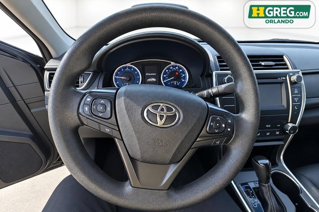 Used 2016 Midnight Black Metallic Toyota LE image 10