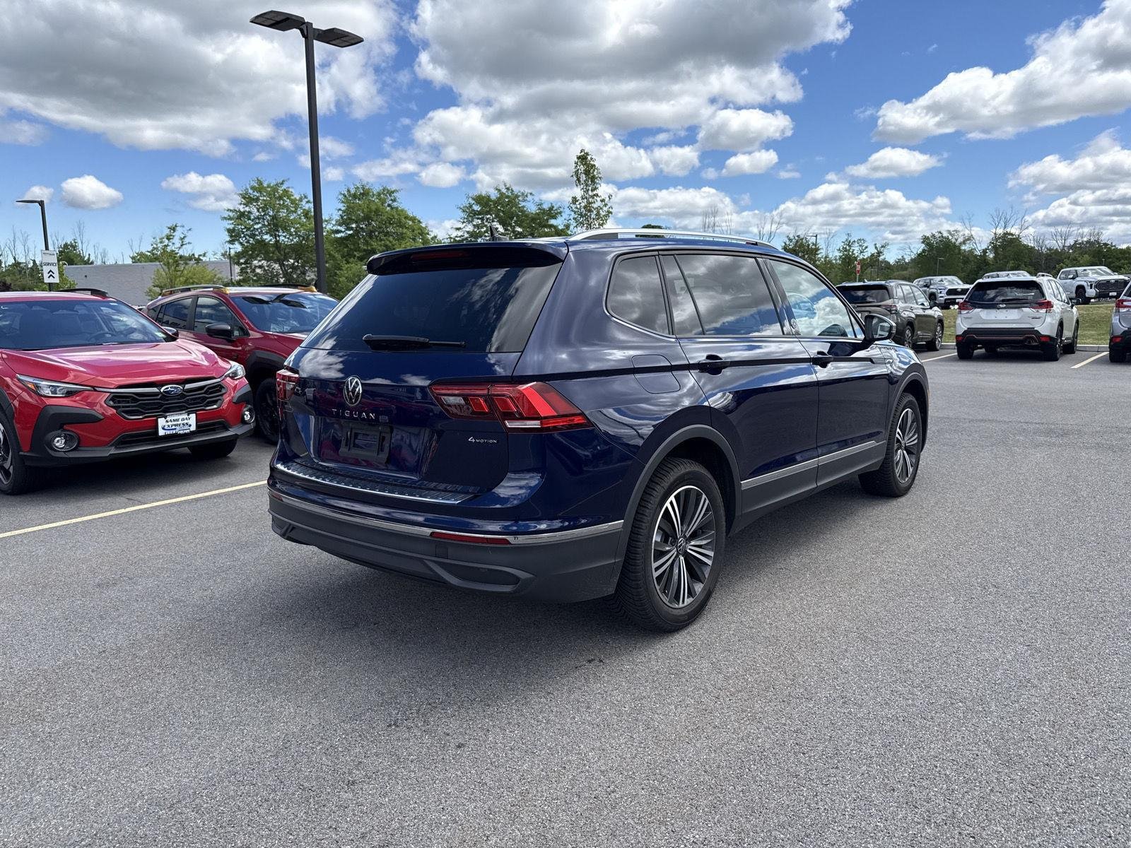 Used 2024 Atlantic Blue Metallic Volkswagen SE image 4