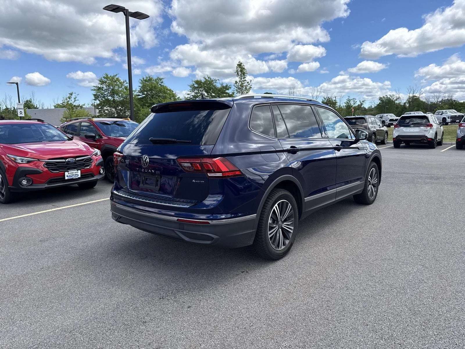 Used 2024 Atlantic Blue Metallic Volkswagen SE image 4