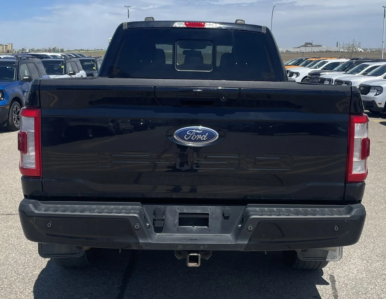 Used 2022 Black Ford LARIAT SuperCrew image 4