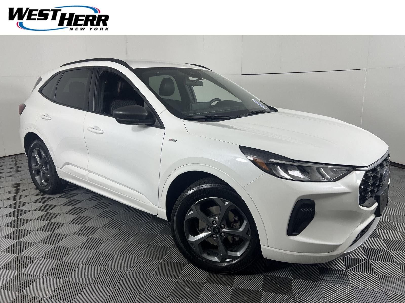 Used 2023 Star White Metallic Tri-Coat Ford ST-Line image 1