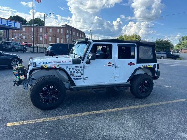 Used 2014 Jeep Wrangler Unlimited Sport with VIN 1C4BJWDG0EL120239 for sale in Middlesboro, KY