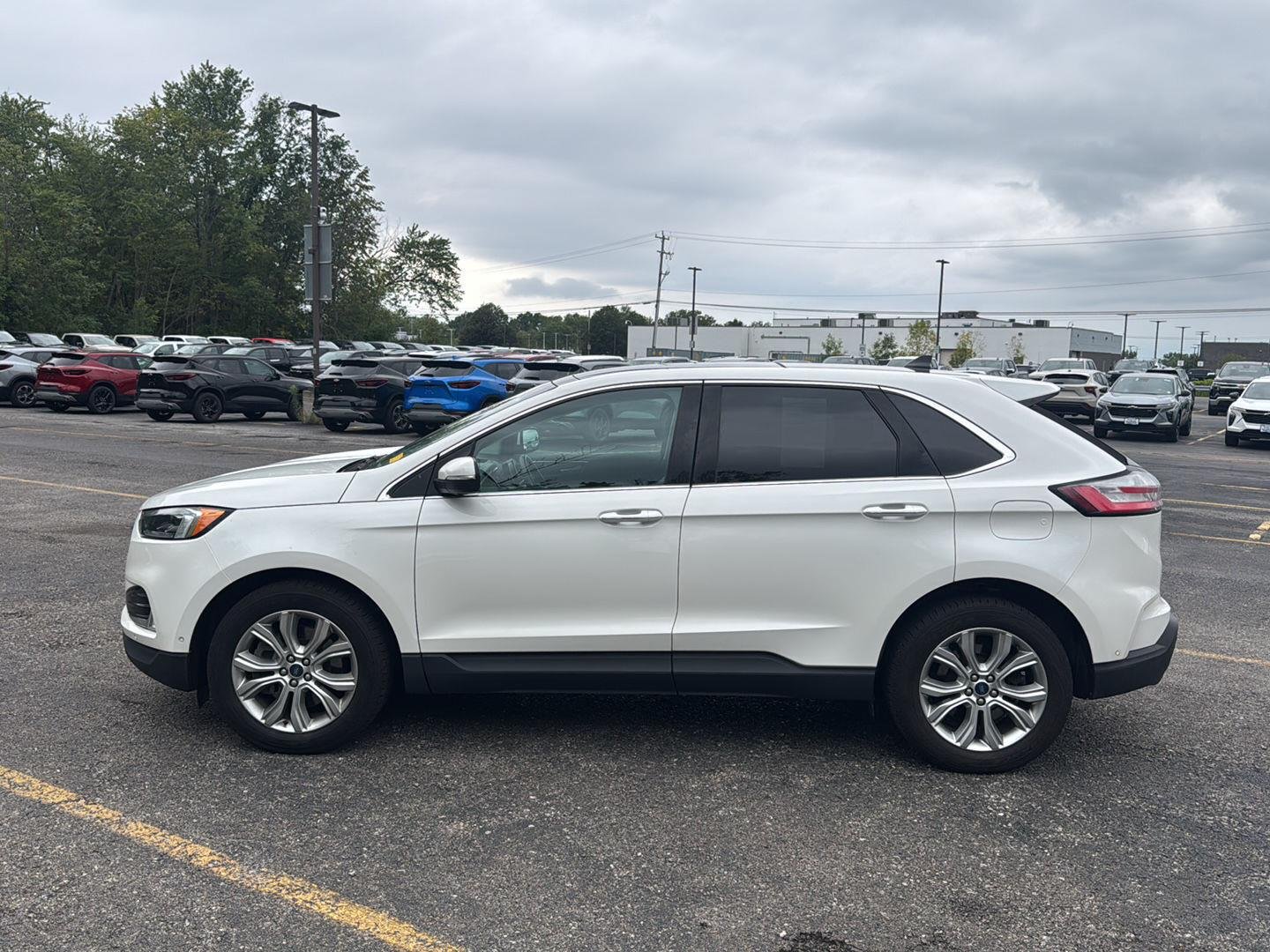 Used 2021 Star White Metallic Tri-Coat Ford Titanium image 6