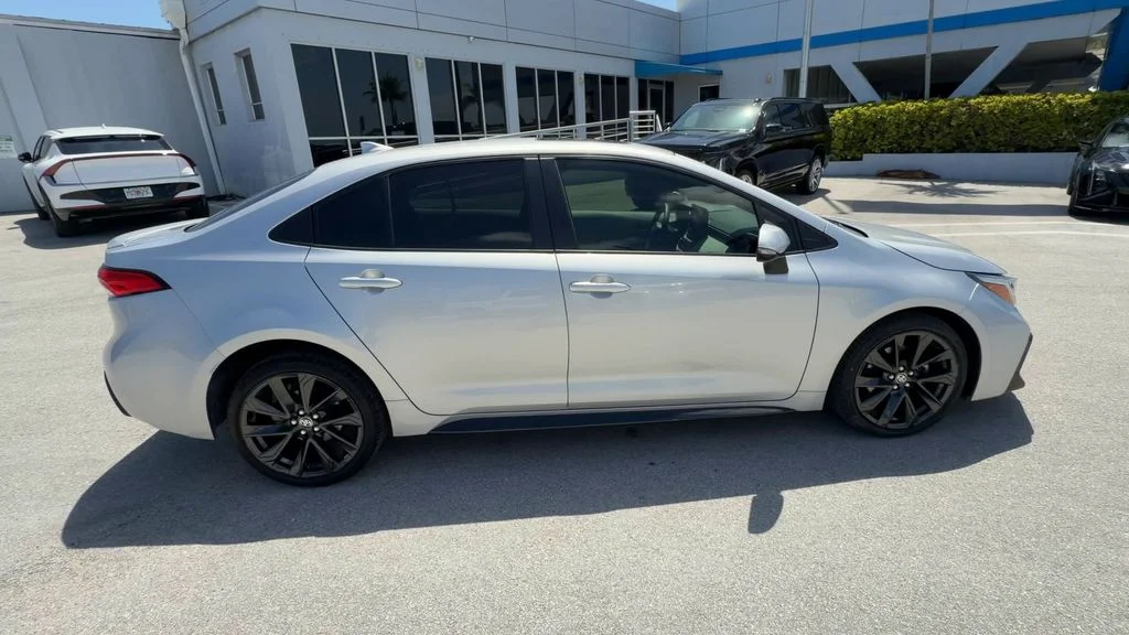 Used 2023 Classic Silver Metallic Toyota SE image 9