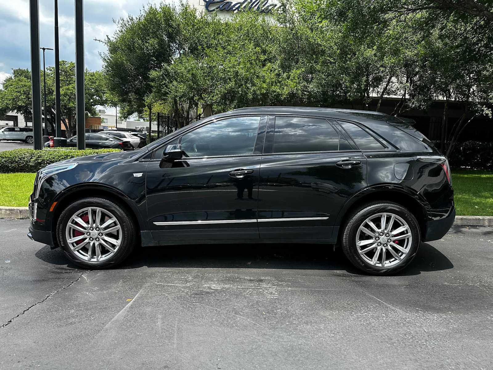 Certified Used 2024 Stellar Black Metallic Cadillac Sport image 5