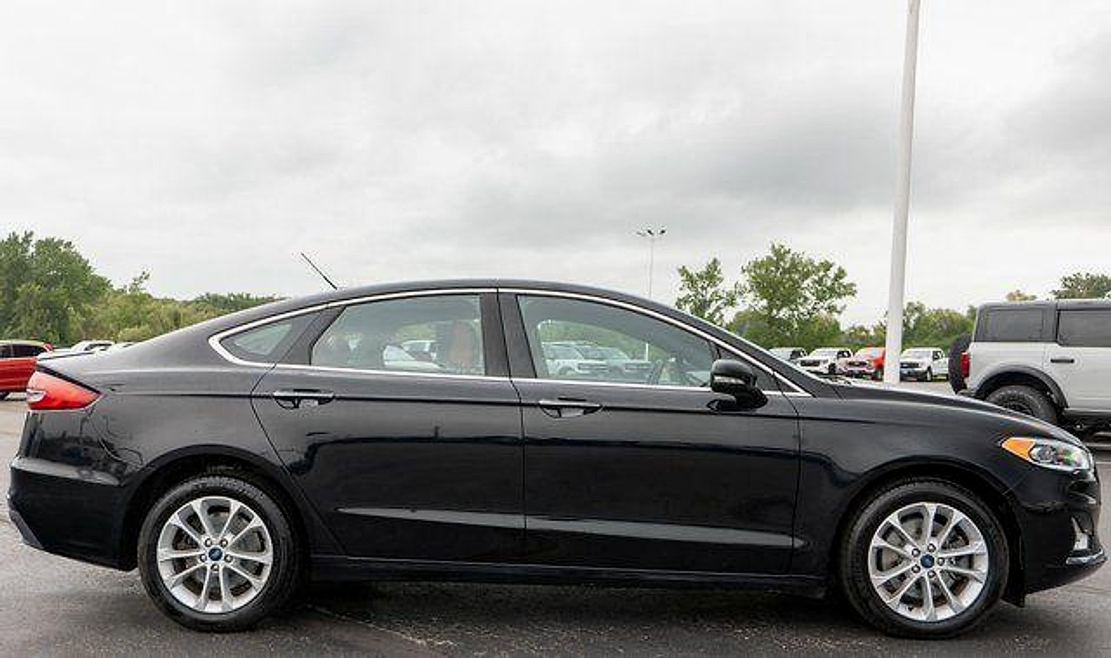 Used 2020 Agate Black Metallic Ford Plug-In Hybrid Titanium image 5