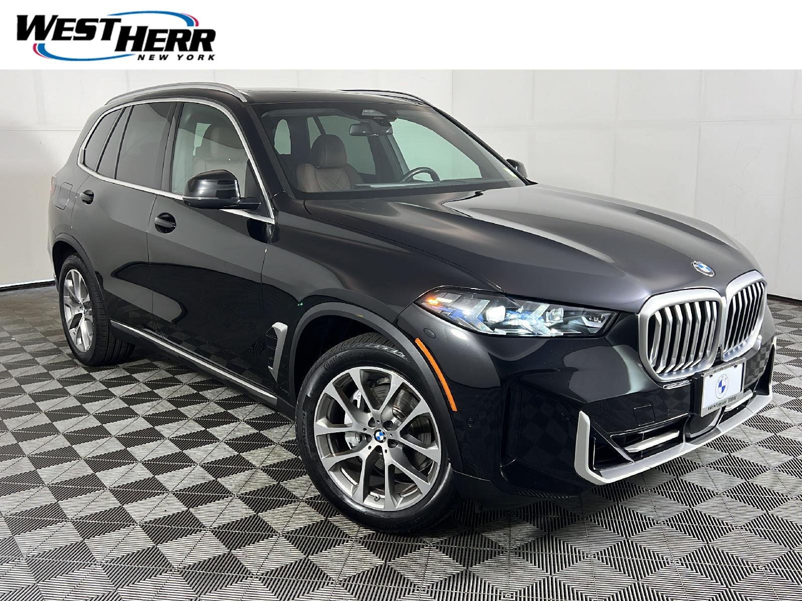 Used 2025 Black Sapphire Metallic BMW xDrive40i image 1