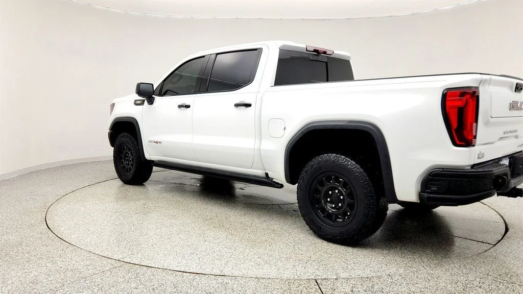 Used 2024 Summit White GMC 4WD Crew Cab 147"" AT4X image 7