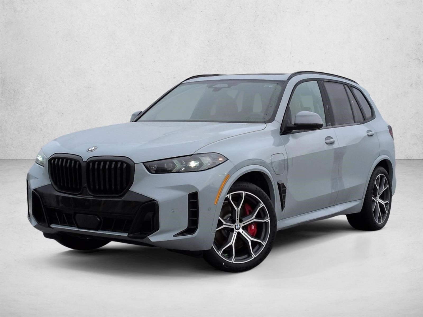 Used 2026 Brooklyn Grey Metallic BMW xDrive50e image 1