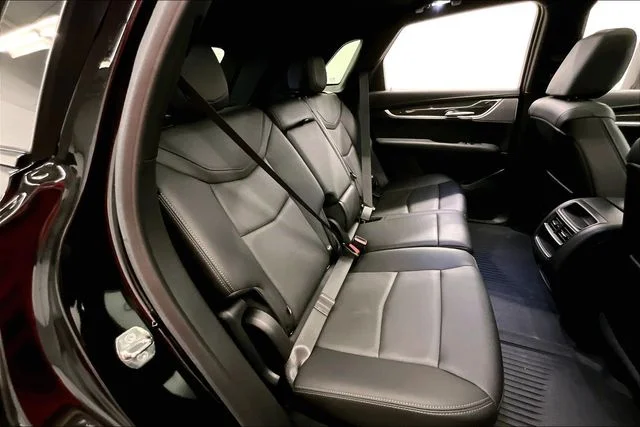 Used 2024 Stellar Black Metallic Cadillac Sport image 26