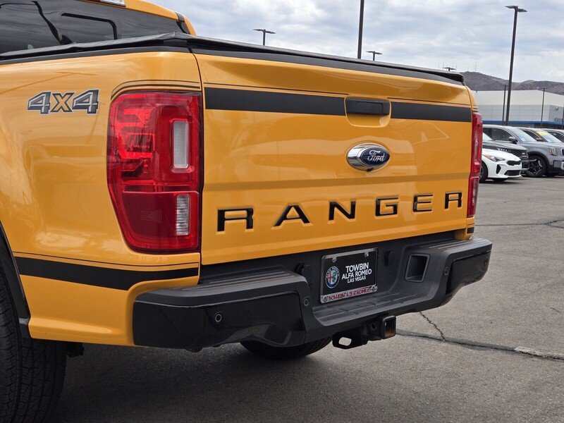 Used 2022 Orange Metallic FORD XLT 4WD SUPERCREW 5