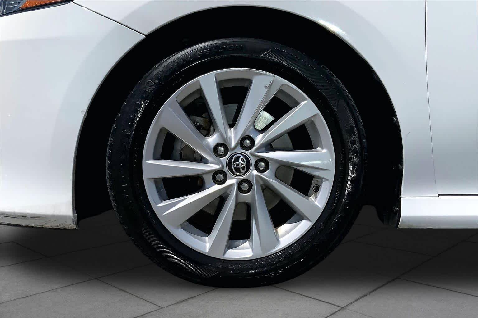 Used 2021 Super White Toyota LE image 11