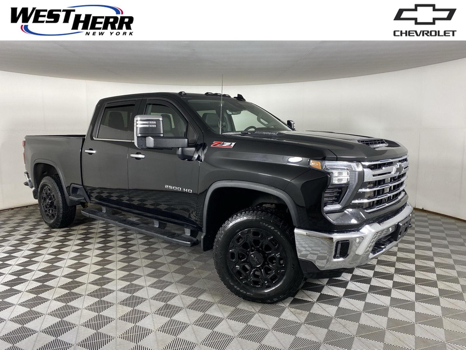 Used 2024 Black Chevrolet LTZ image 1