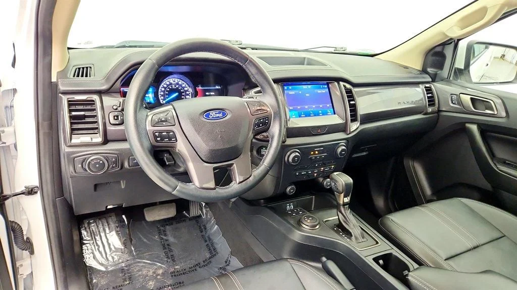 Used 2021 Oxford White Ford LARIAT 4WD SuperCab 6